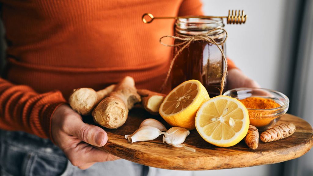 woman holding foods with antioxidants