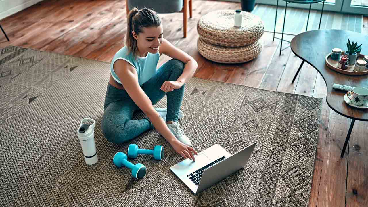 Women sitting in her home working out