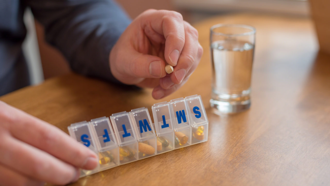 man ordering his essential vitamins for the week.