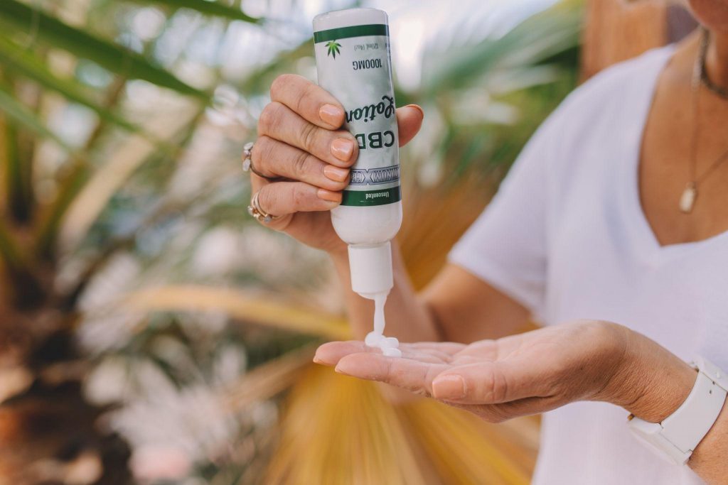 cbd lotion squeezed onto skin