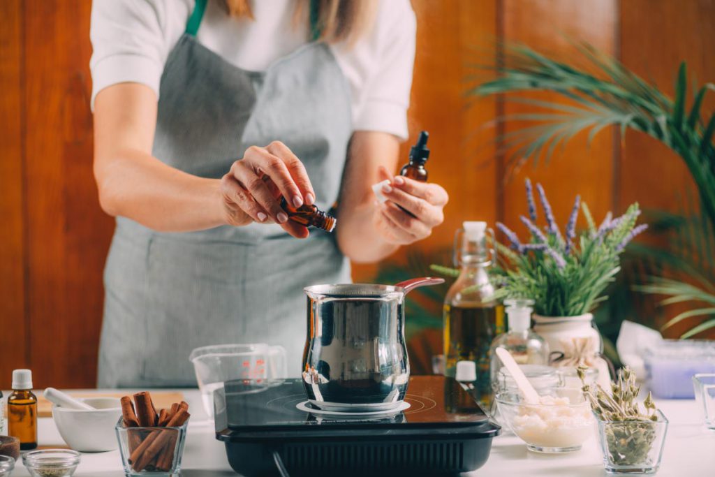 woman using cinnamon essential oils