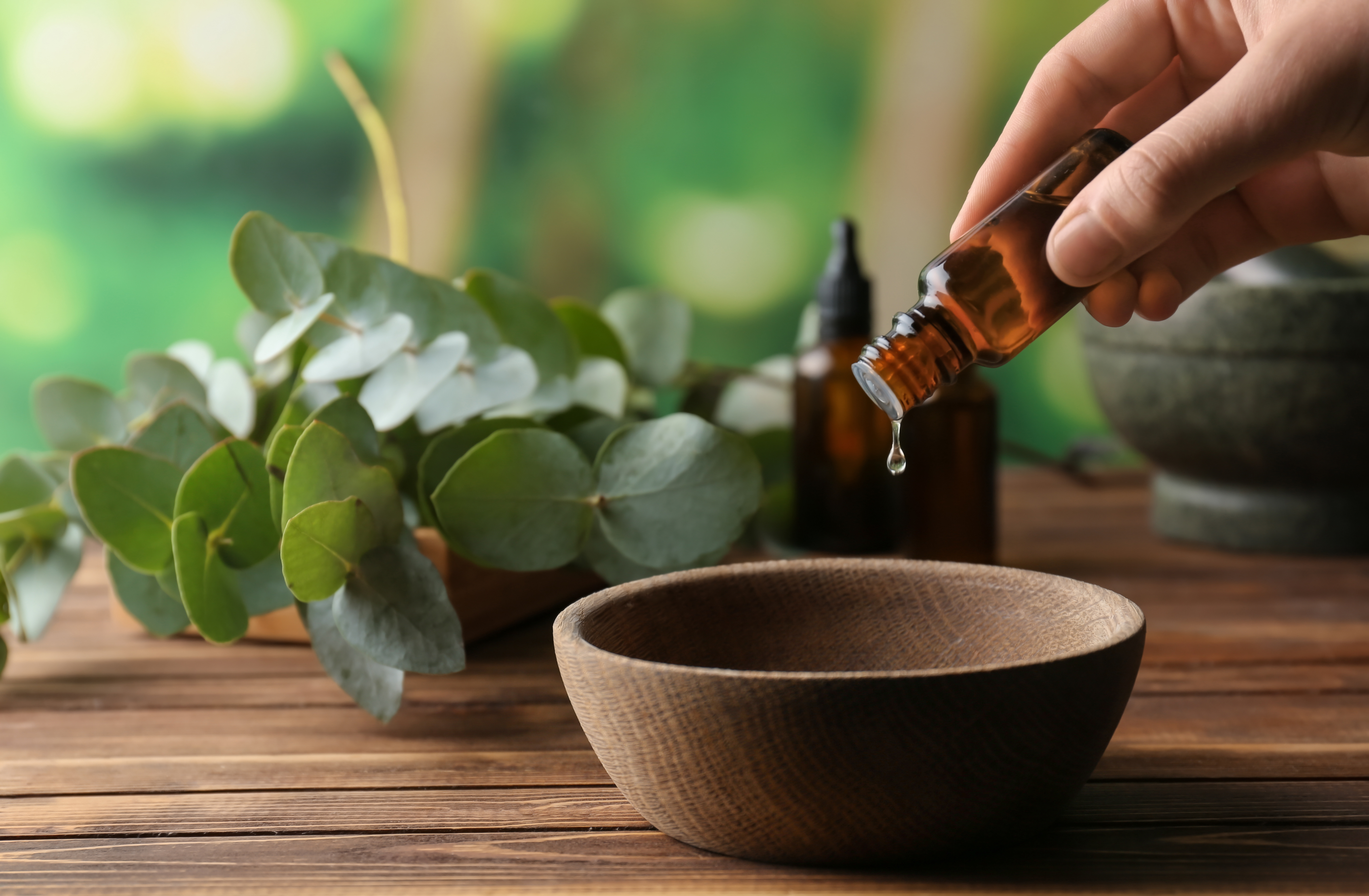 Essential Oils being poured into bowl